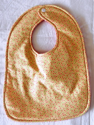 Reversible Bib – Spotty / Red Flowers