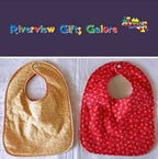 Reversible Bib – Spotty / Red Flowers