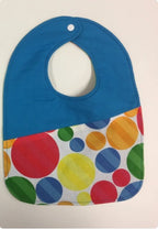 Reversible Bib – Green Dinosaurs / Blue & White with Spots