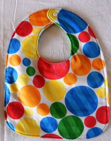Reversible Bib – Green Dinosaurs / White with Spots