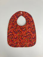 Reversible Bib – Green Dinosaurs / Red with Spots