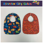 Reversible Bib – Blue Dinosaurs / Red with Spots